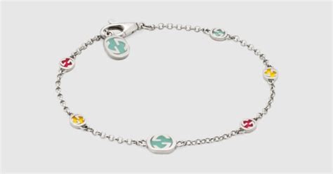 Bracciali Gucci: argento rigidi, a catena, smaltati e con pendente.